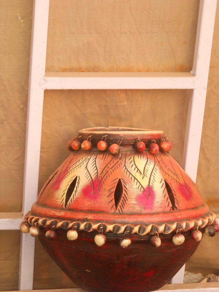 handcrafted terracotta lamp shade. Rs. 800