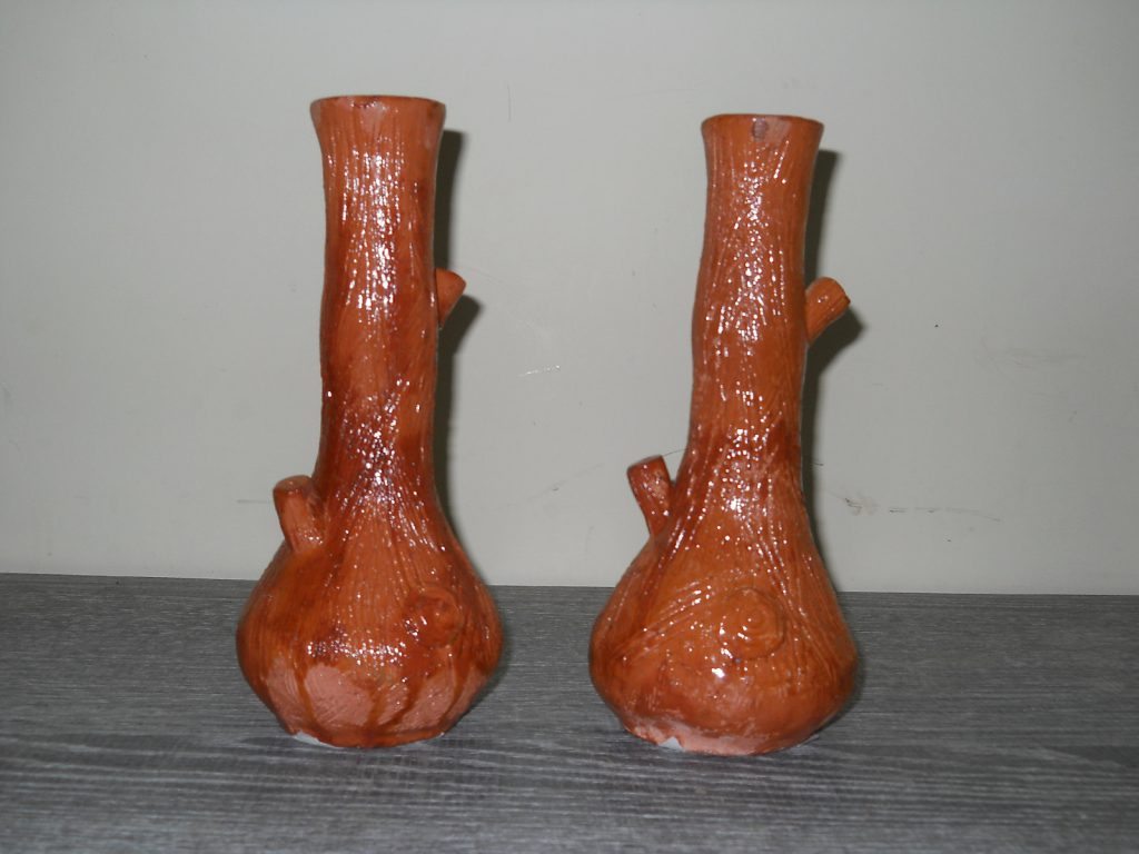 handcrafted ceramic or terracotta bud vases. Rs. 500