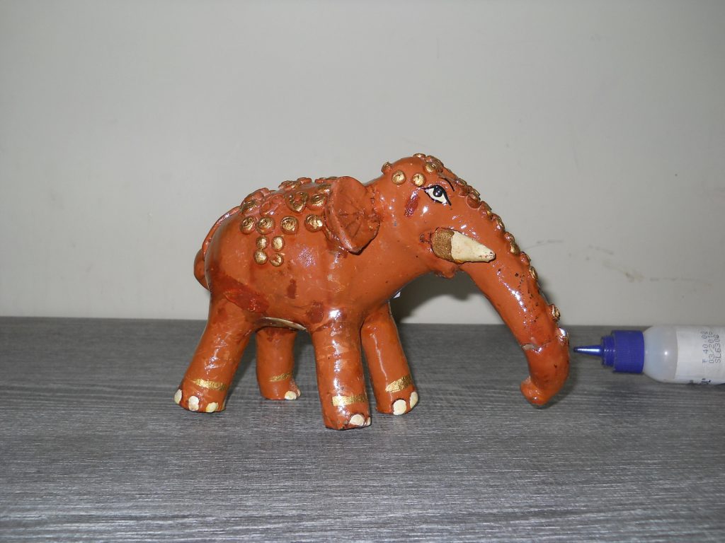handcrafted terracotta elephant figurine. Rs. 500
