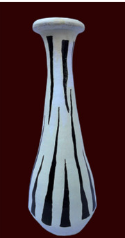 handcrafted terracotta zebra-themed vase. Rs. 500